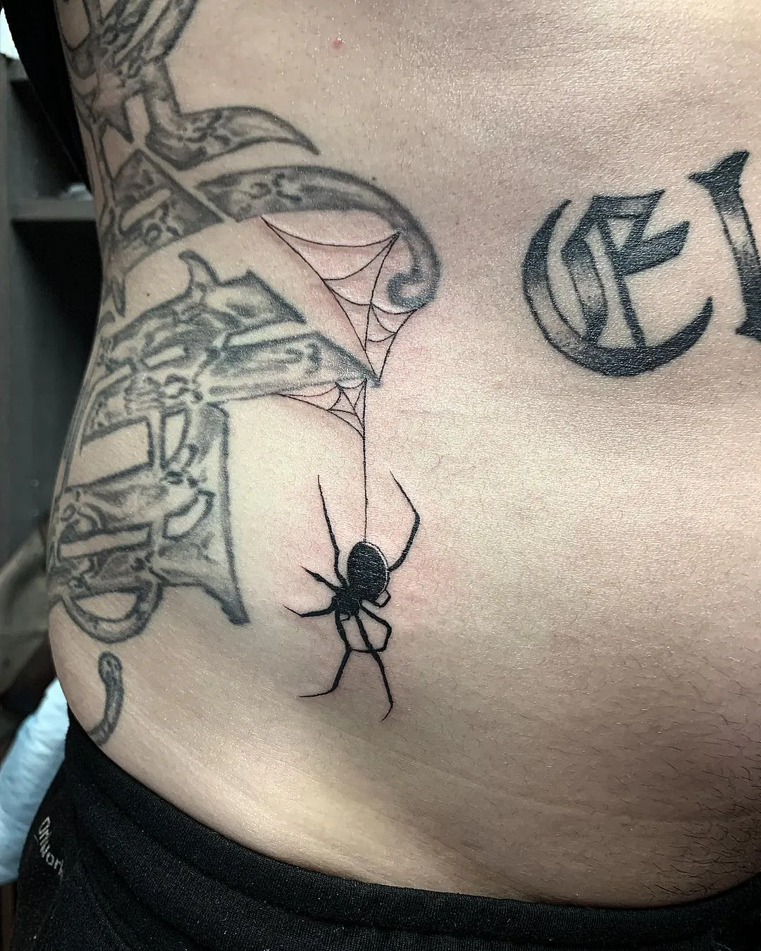 Black widow spider tattoo 11